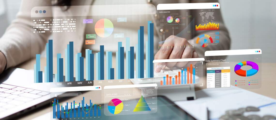 Professional interacting with digital business analytics dashboards displaying charts, data graphs, and financial metric