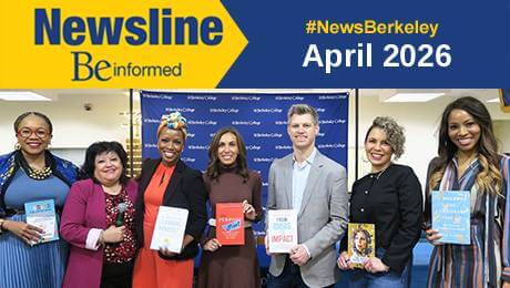 Seven people stand smiling, each holding a book, against a backdrop with Berkely College logo